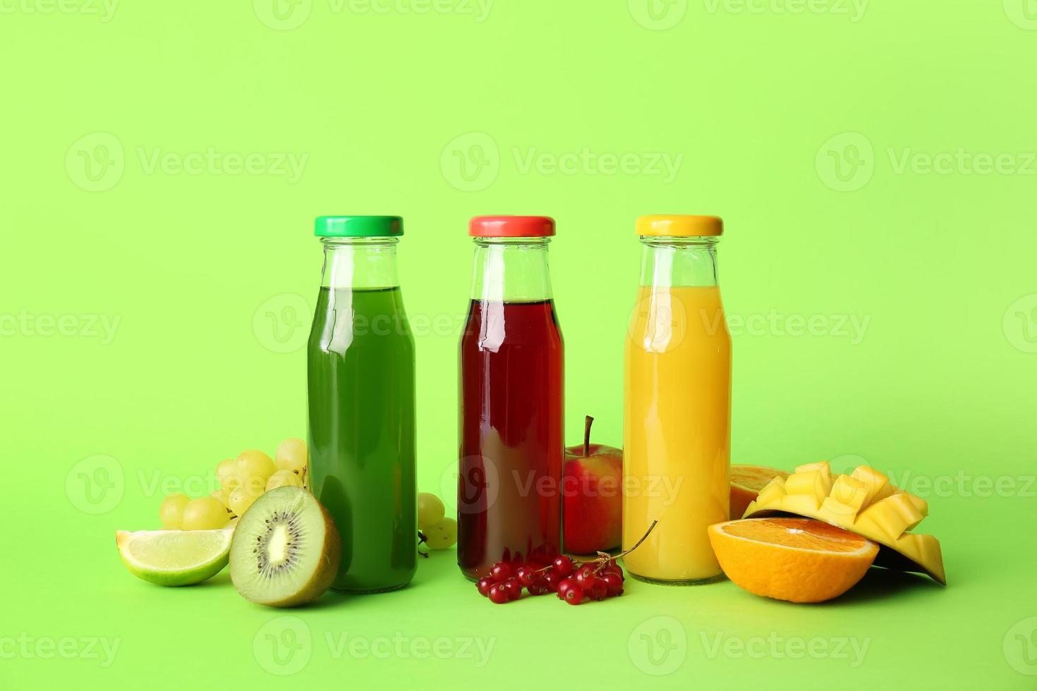 Different healthy juice on color background photo