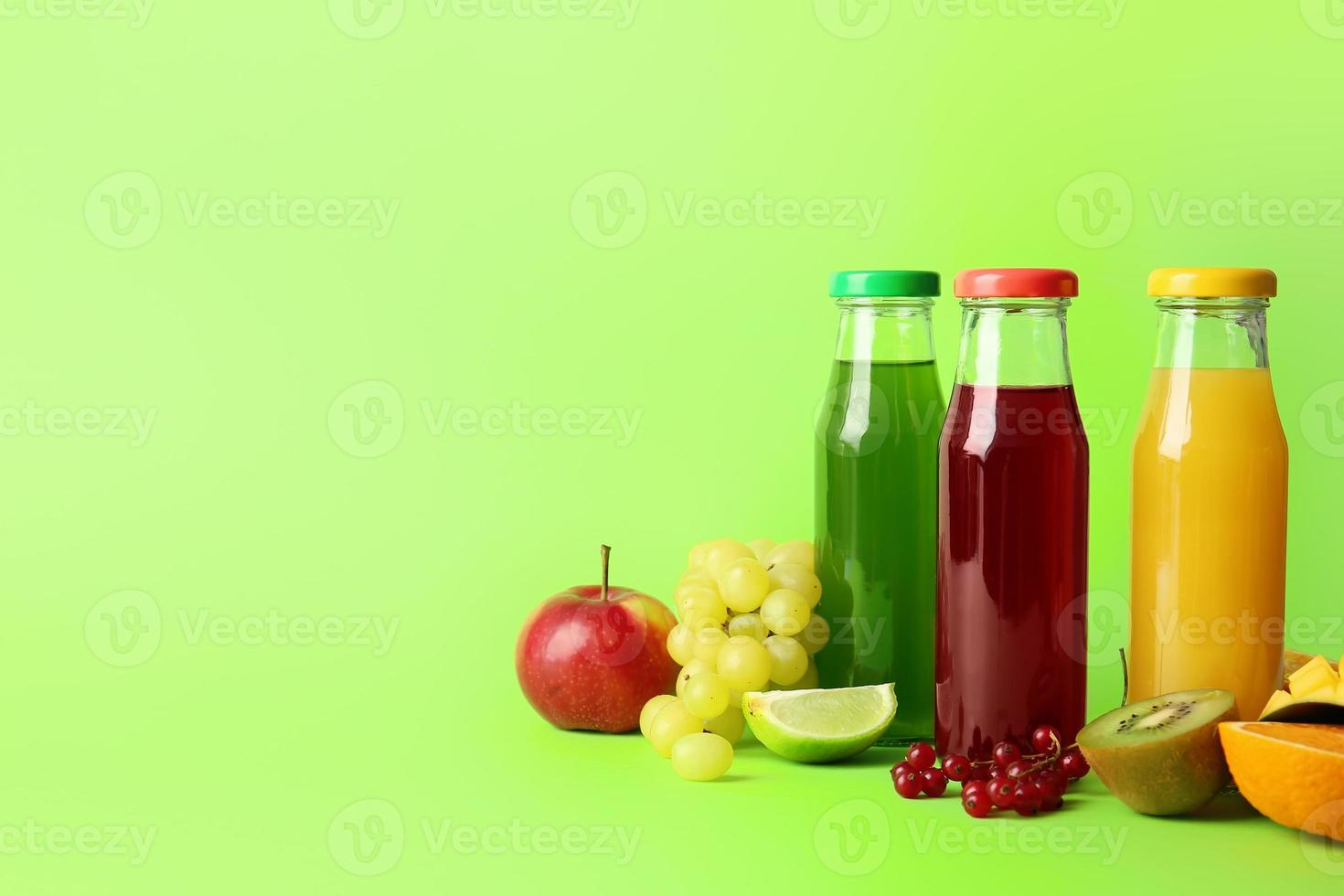 Different healthy juice on color background photo