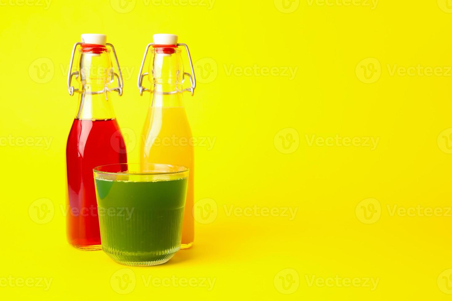 Different healthy juice on color background photo