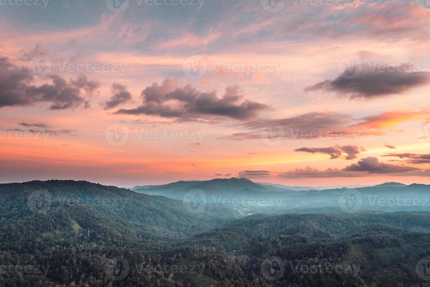 mountains and evening sky at rural village photo