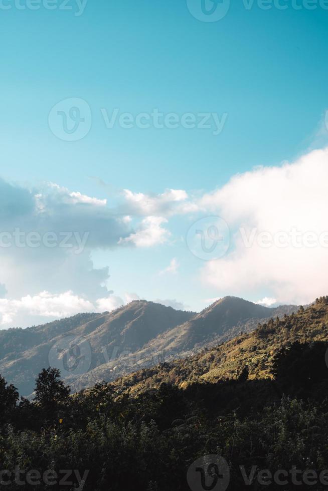 Scenic View Of Mountains Against Sky During Sunset photo