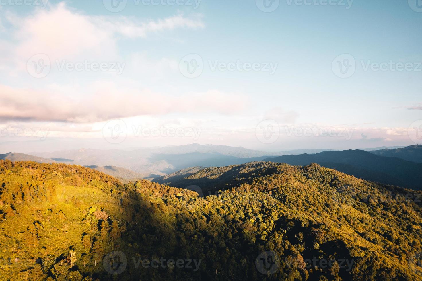 Scenic View Of Mountains Against Sky During Sunset photo