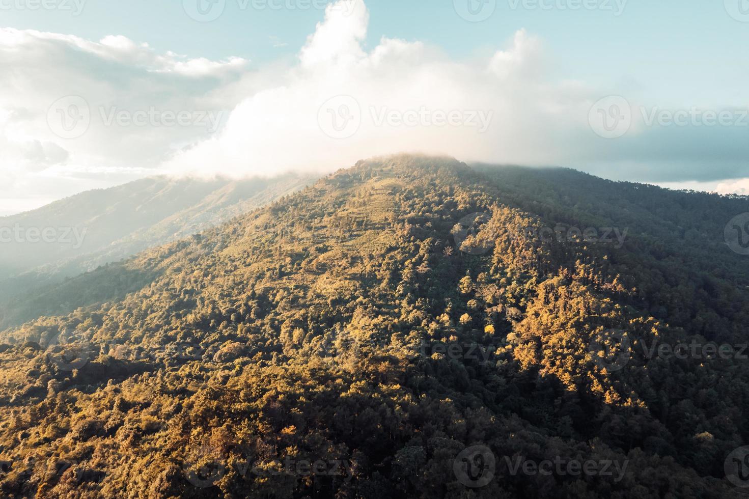 Scenic View Of Mountains Against Sky During Sunset photo