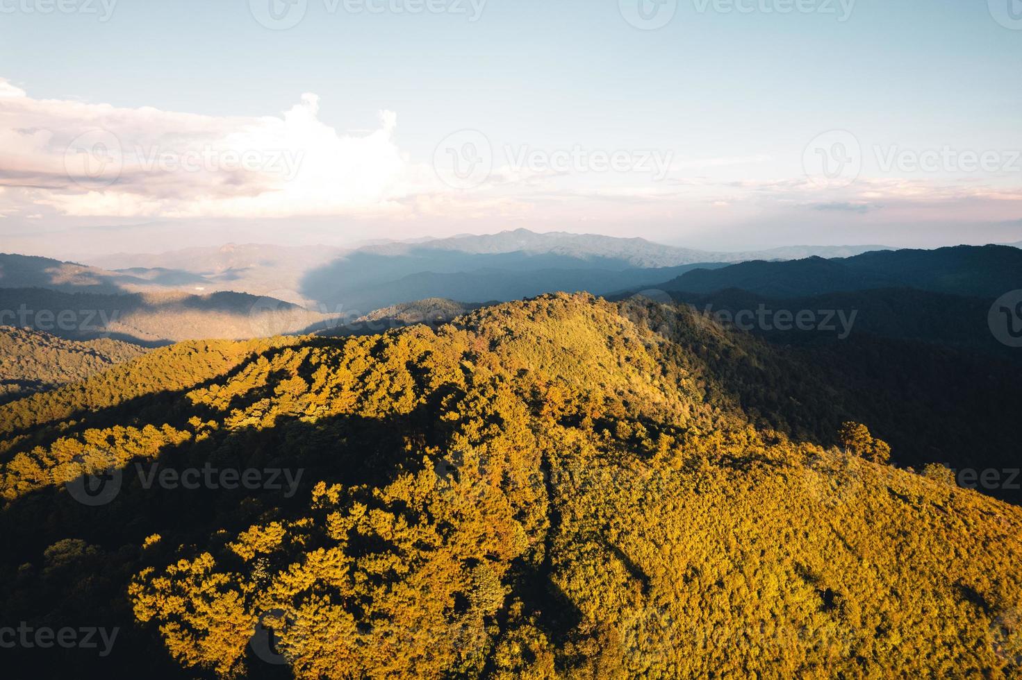 Scenic View Of Mountains Against Sky During Sunset photo