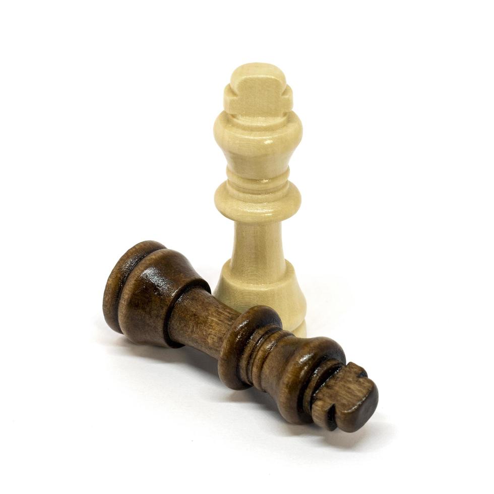 Wooden chess in a variety of positions. photo