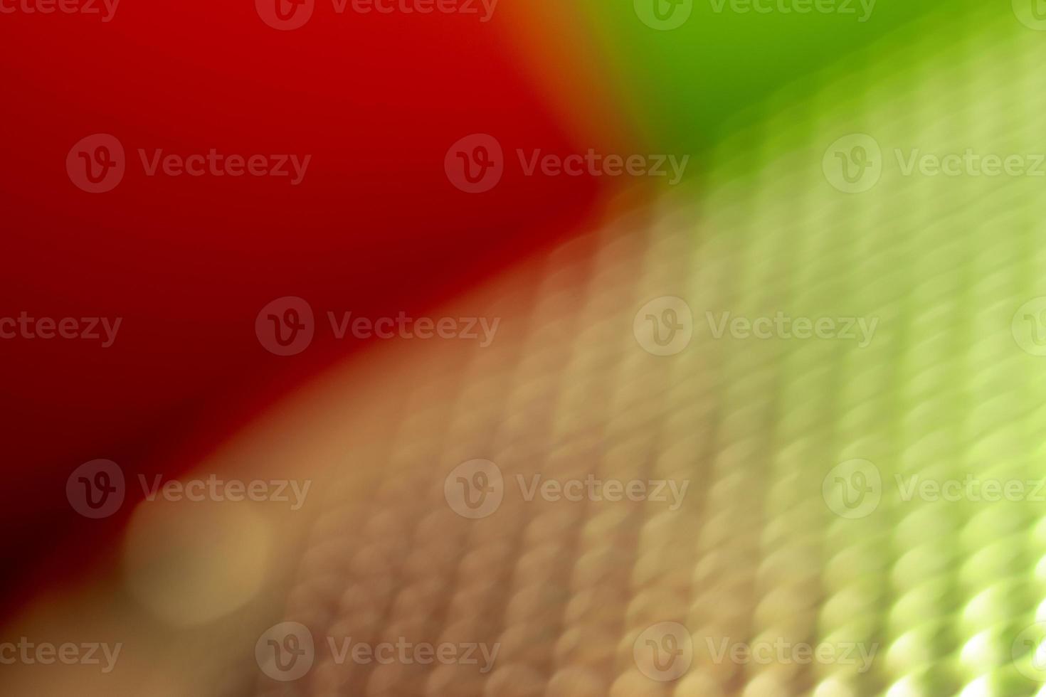 Abstract multicolor perforated metal background photo