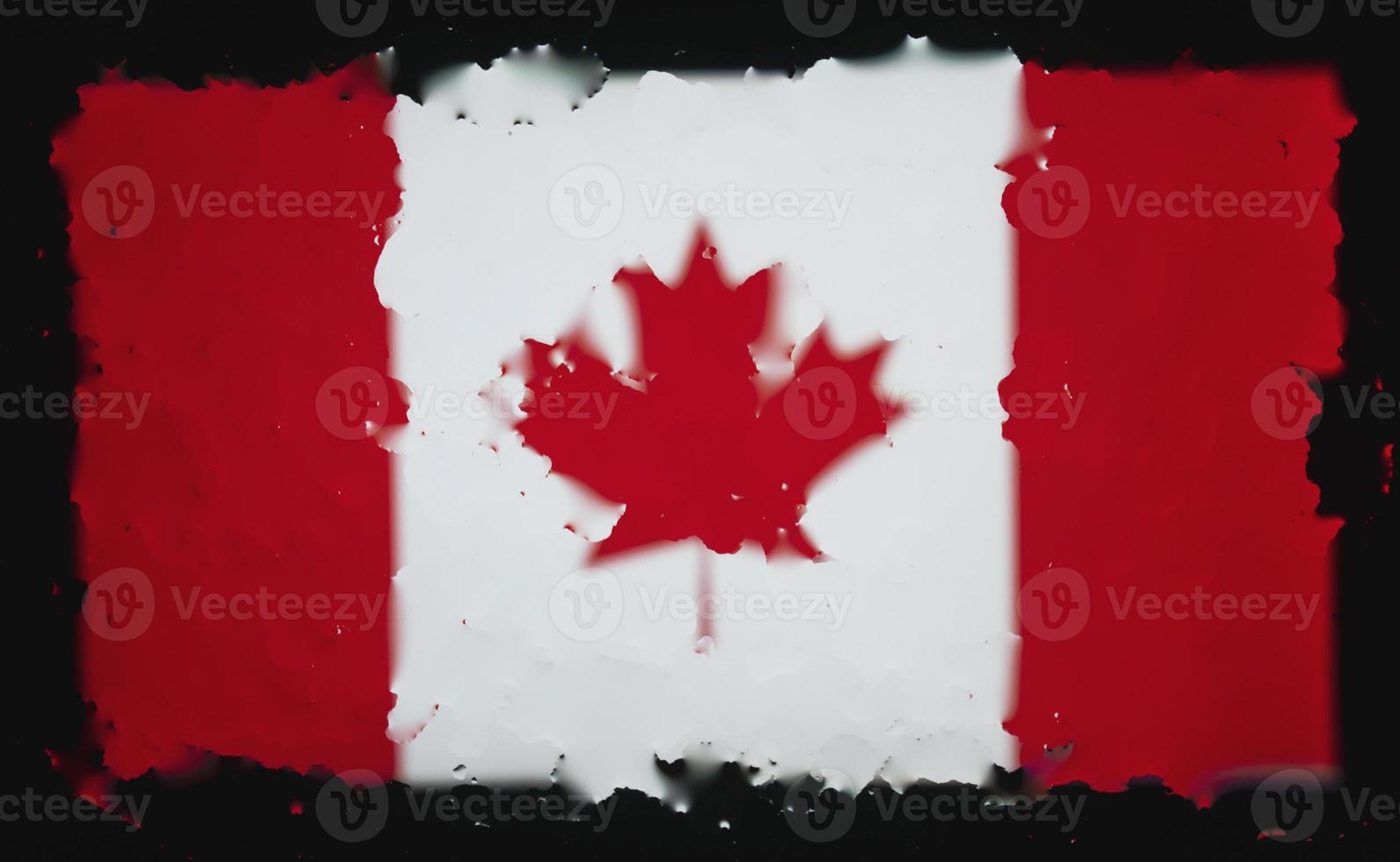 Drops of water on Canadian flag background. Shallow depth of field. Selective focus. Toned. photo