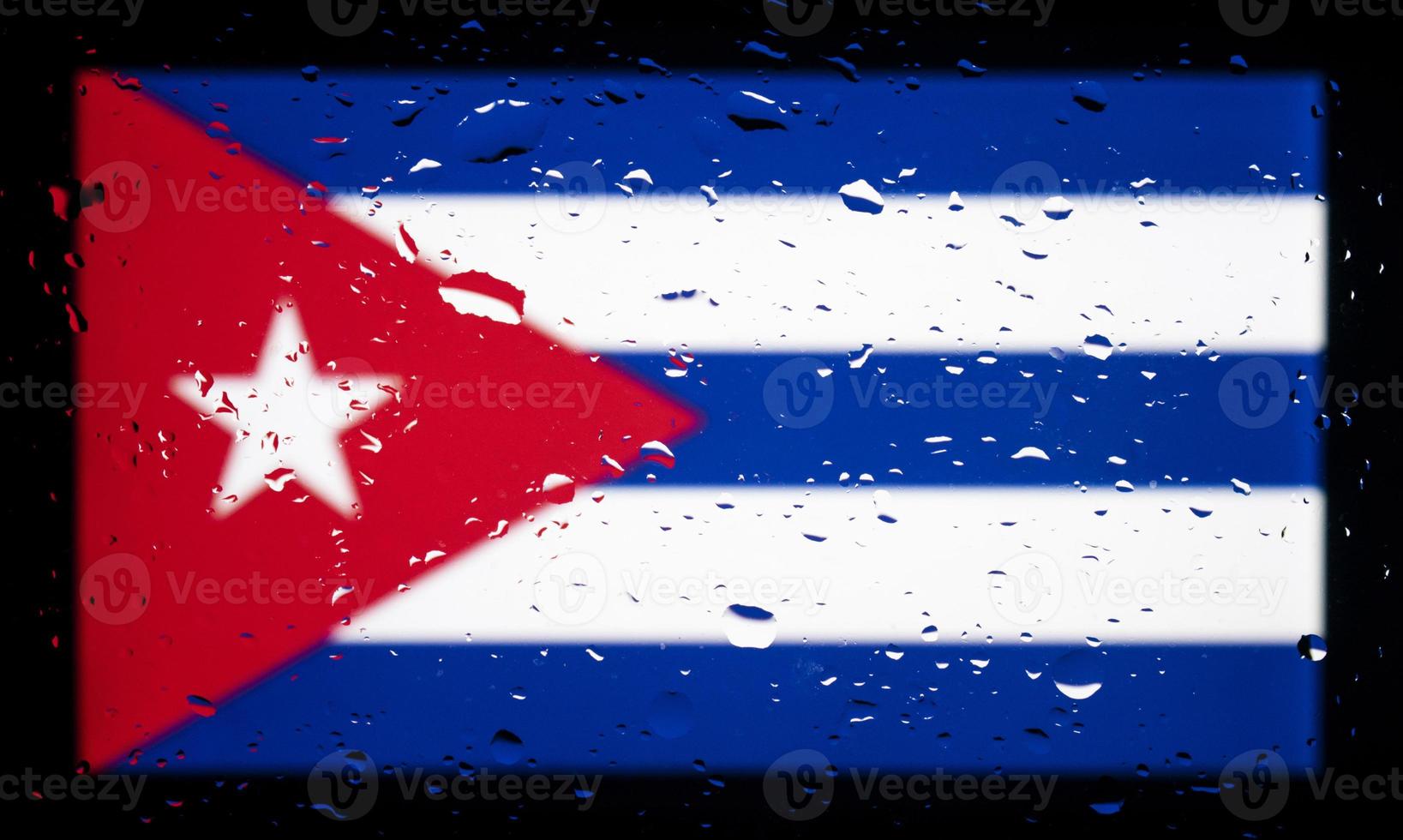 Drops of water on Cuba flag background. Shallow depth of field. Selective focus. Toned. photo