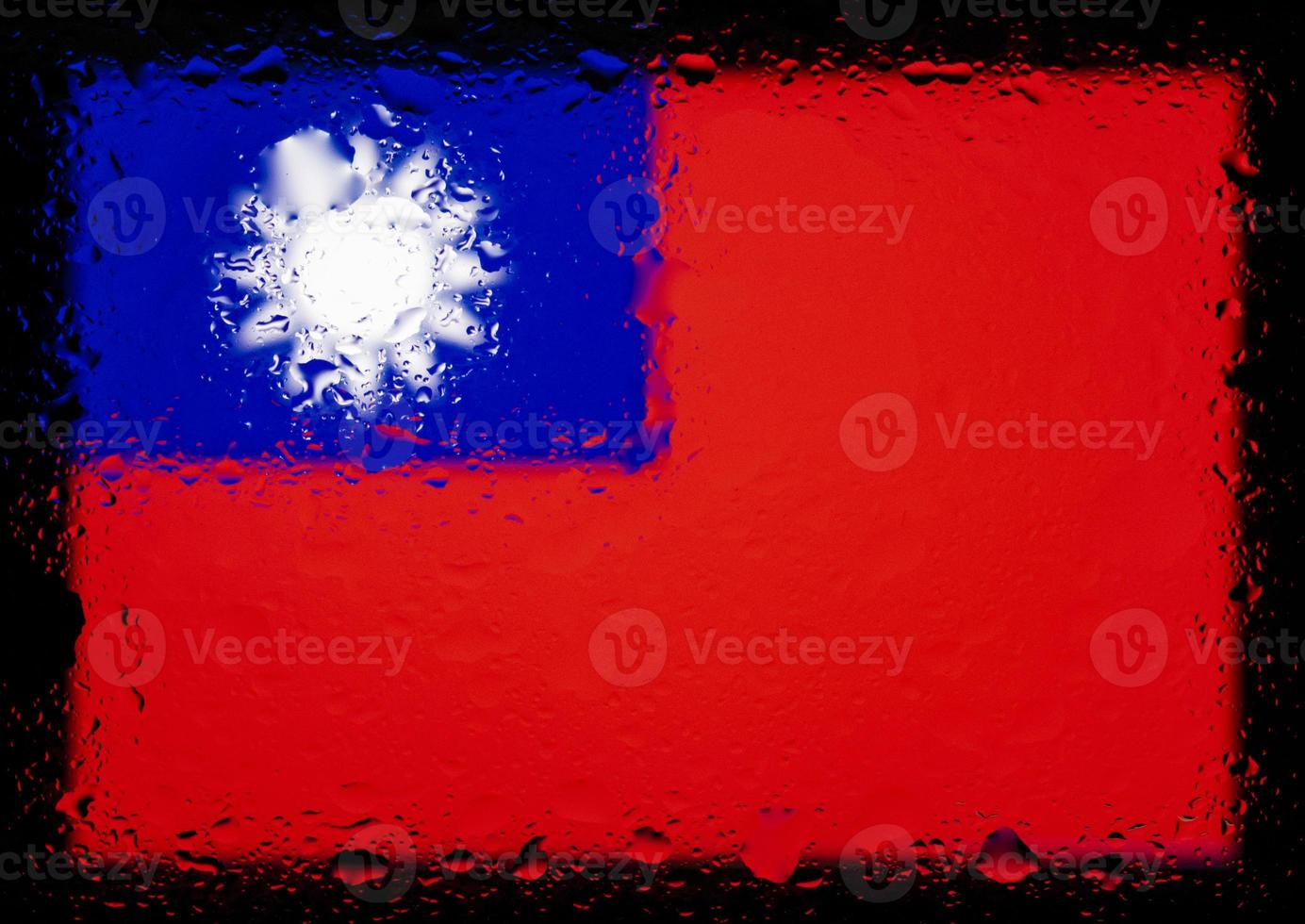 Drops of water on Taiwan flag background. Shallow depth of field. Selective focus. Toned. photo