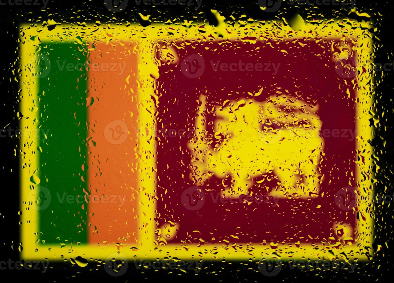 Drops of water on Sri Lanka flag background. Shallow depth of field. Selective focus. Toned. photo