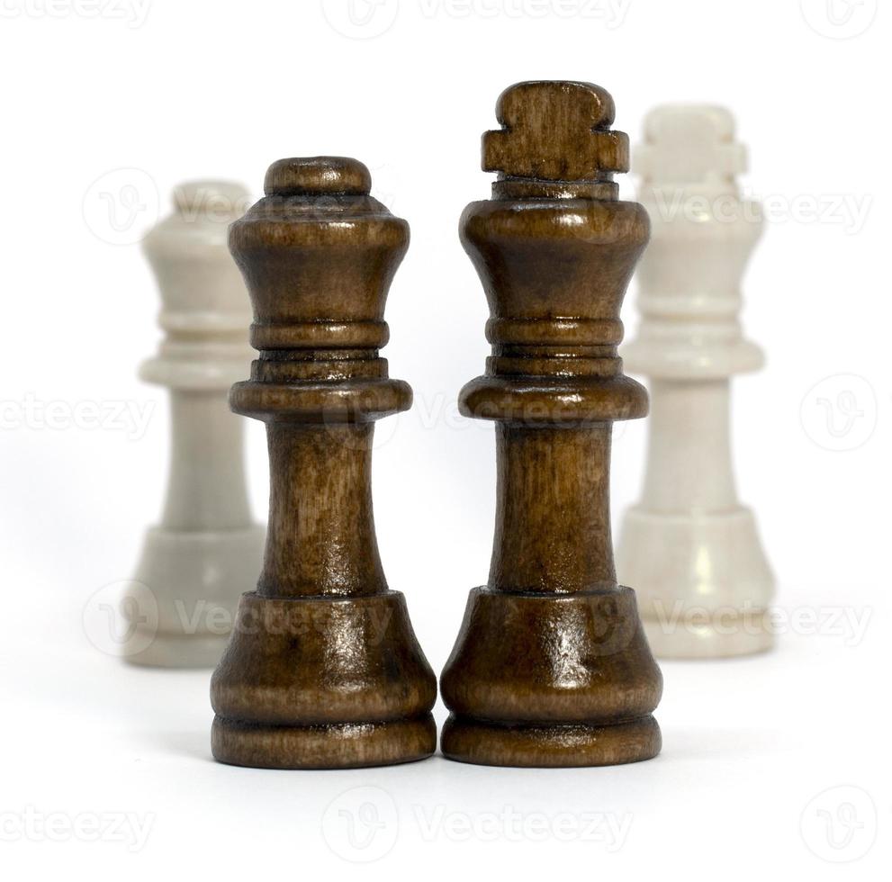 Wooden chess in a variety of positions. photo