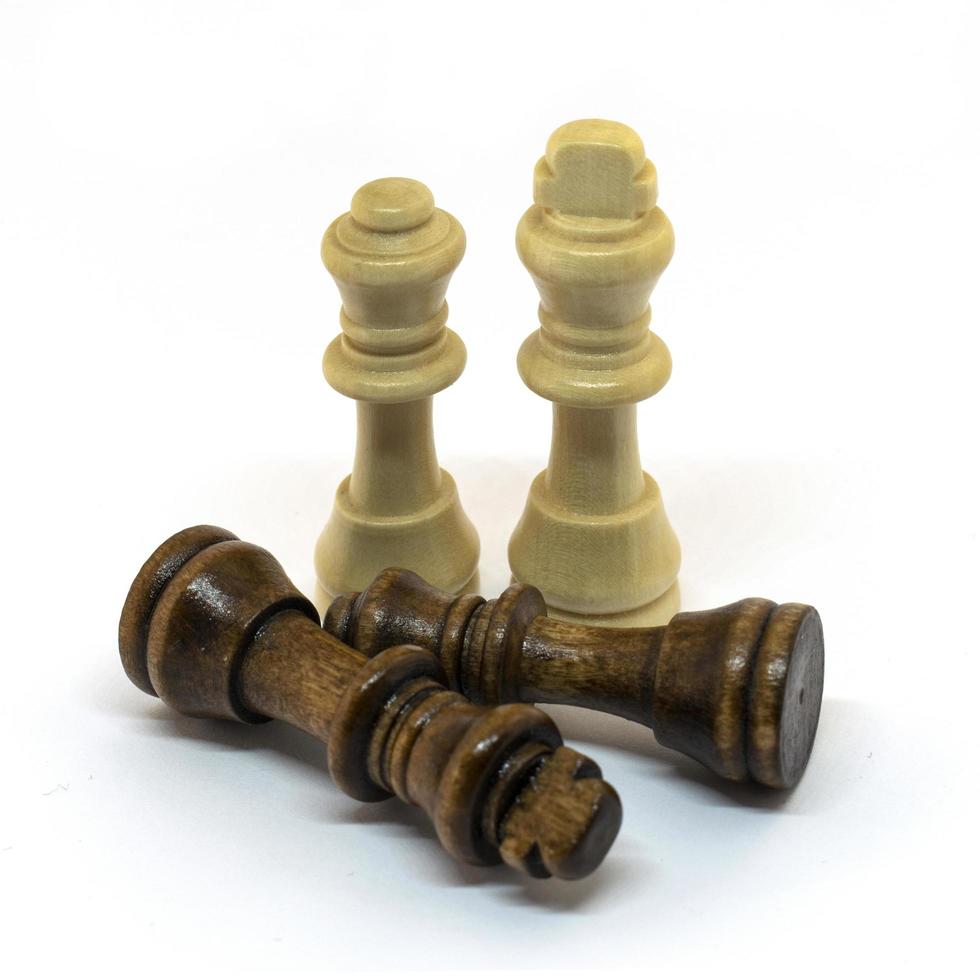 Wooden chess in a variety of positions. photo