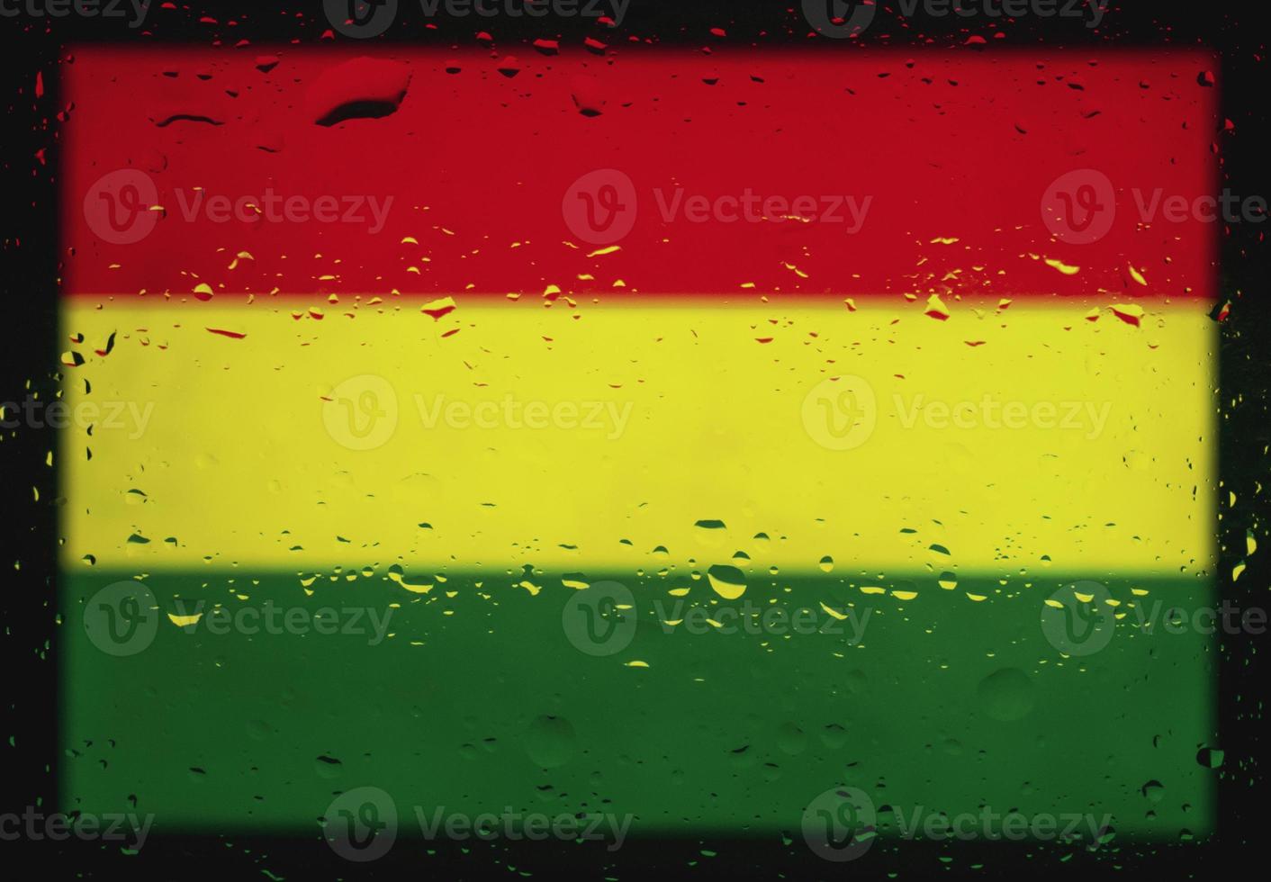 Drops of water on Bolivia flag background. Shallow depth of field. Selective focus. Toned. photo