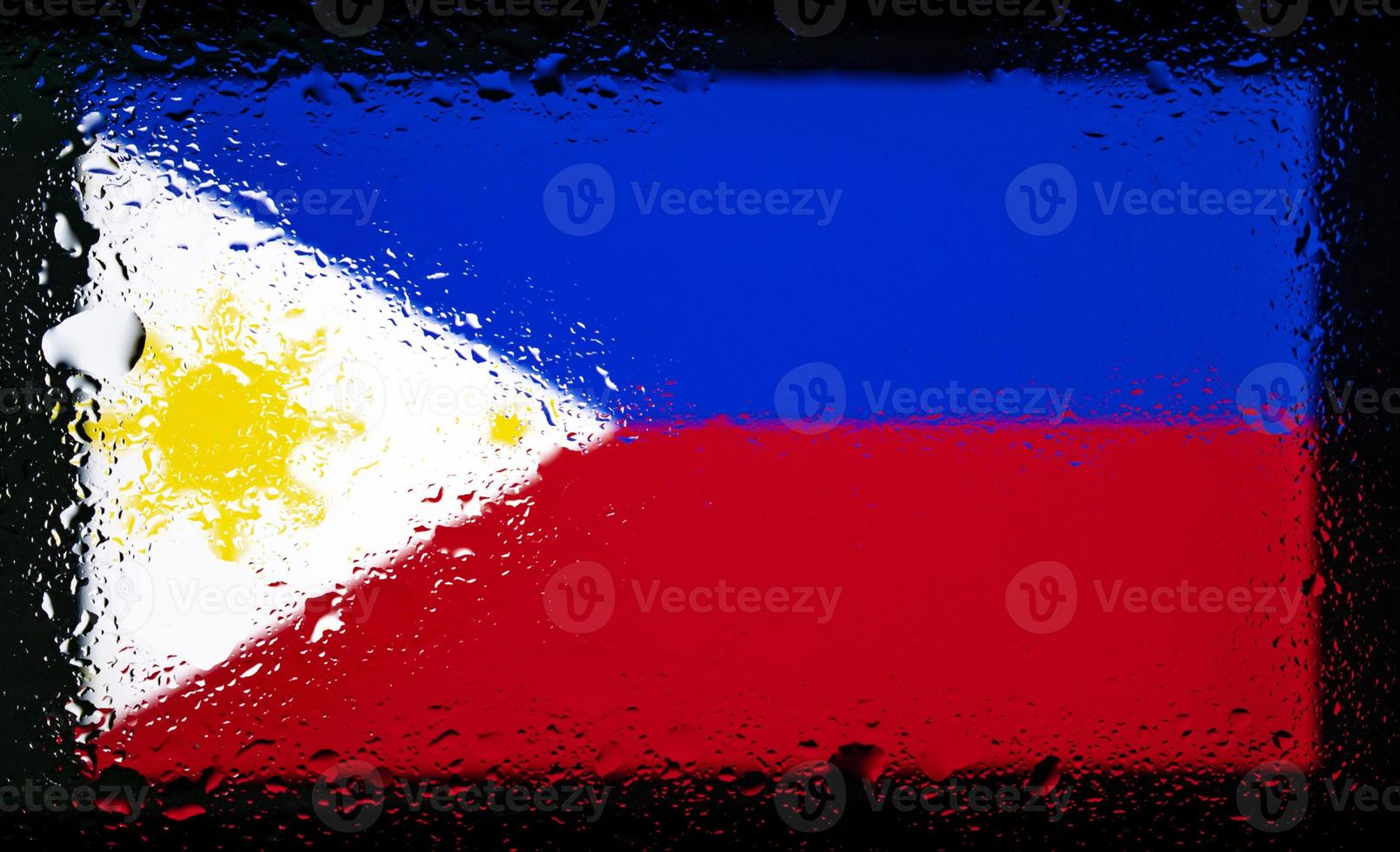 Drops of water on Philippines flag background. Shallow depth of field. Selective focus. Toned. photo