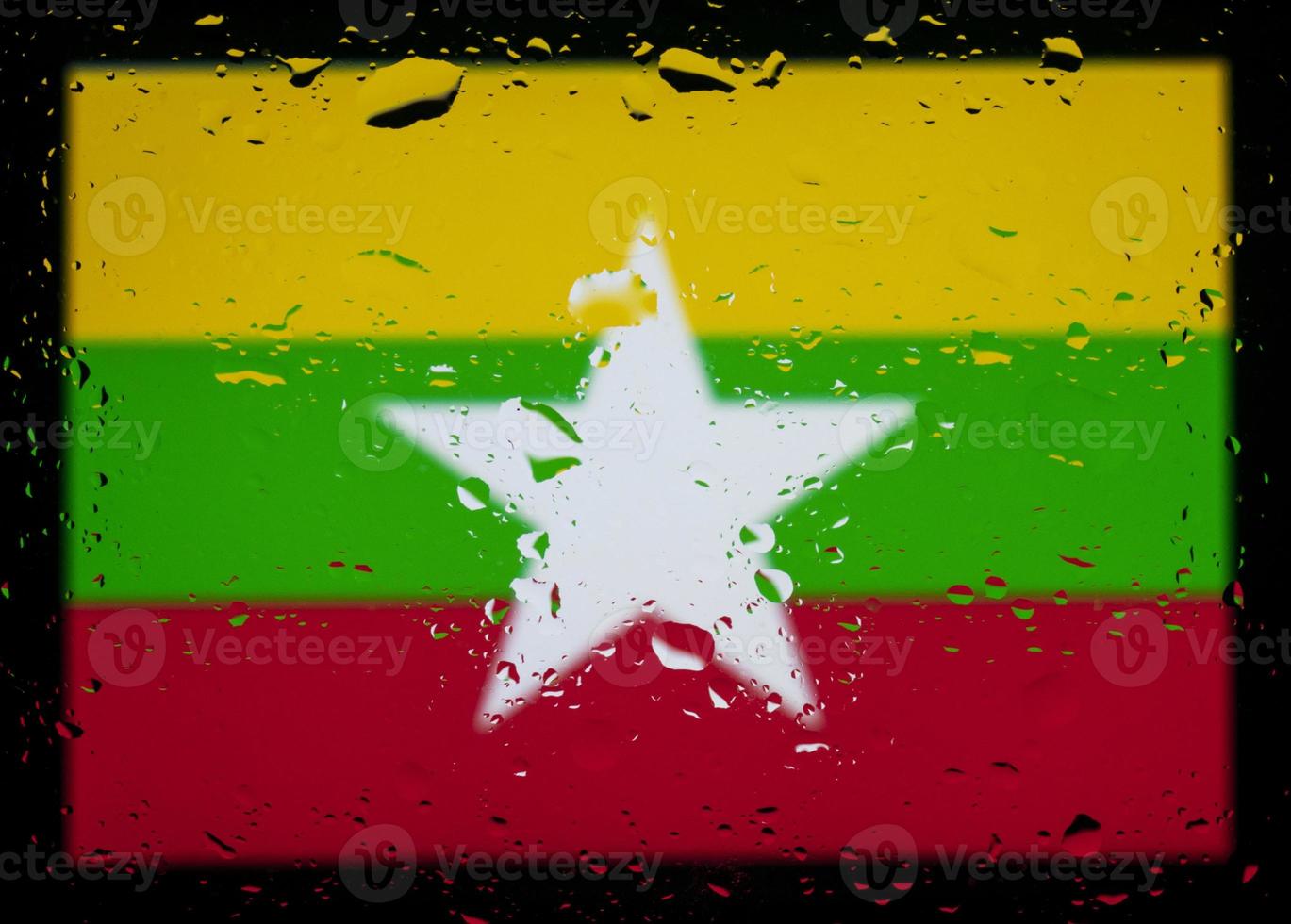 Drops of water on myanmar flag background. Shallow depth of field. Selective focus. Toned. photo