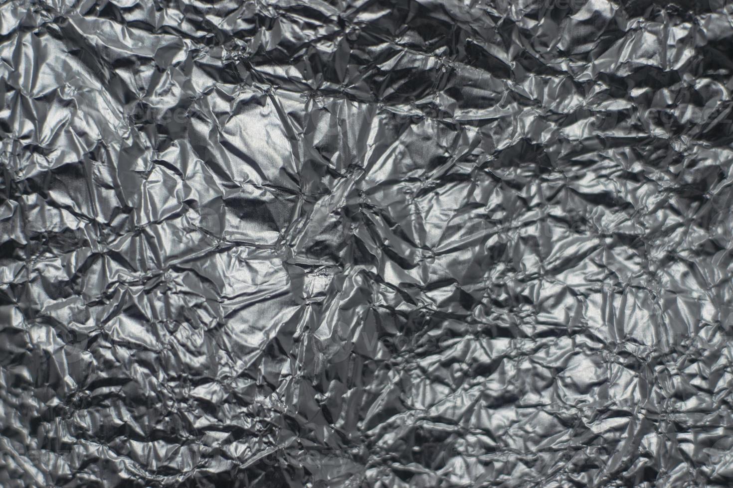 Foil silver crumpled metal aluminum texture photo