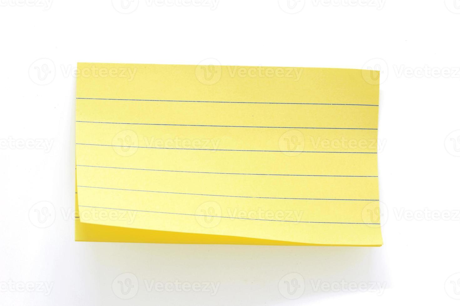 yellow paper with lines for notes, paper background photo