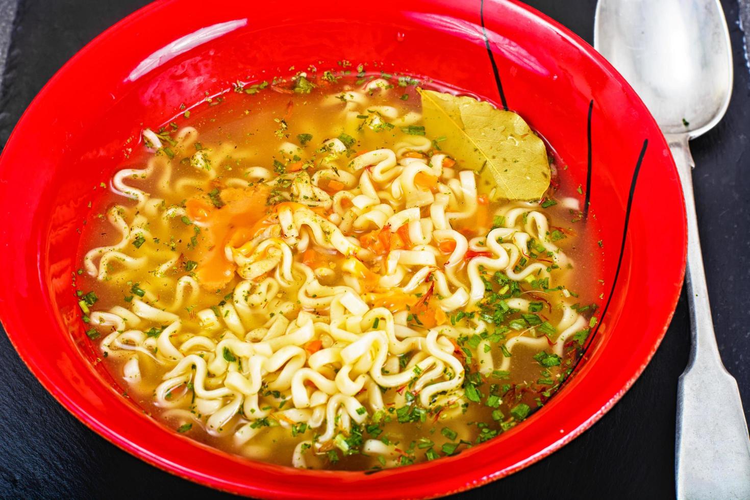 Tasty Chicken Soup with Chinese Noodles photo