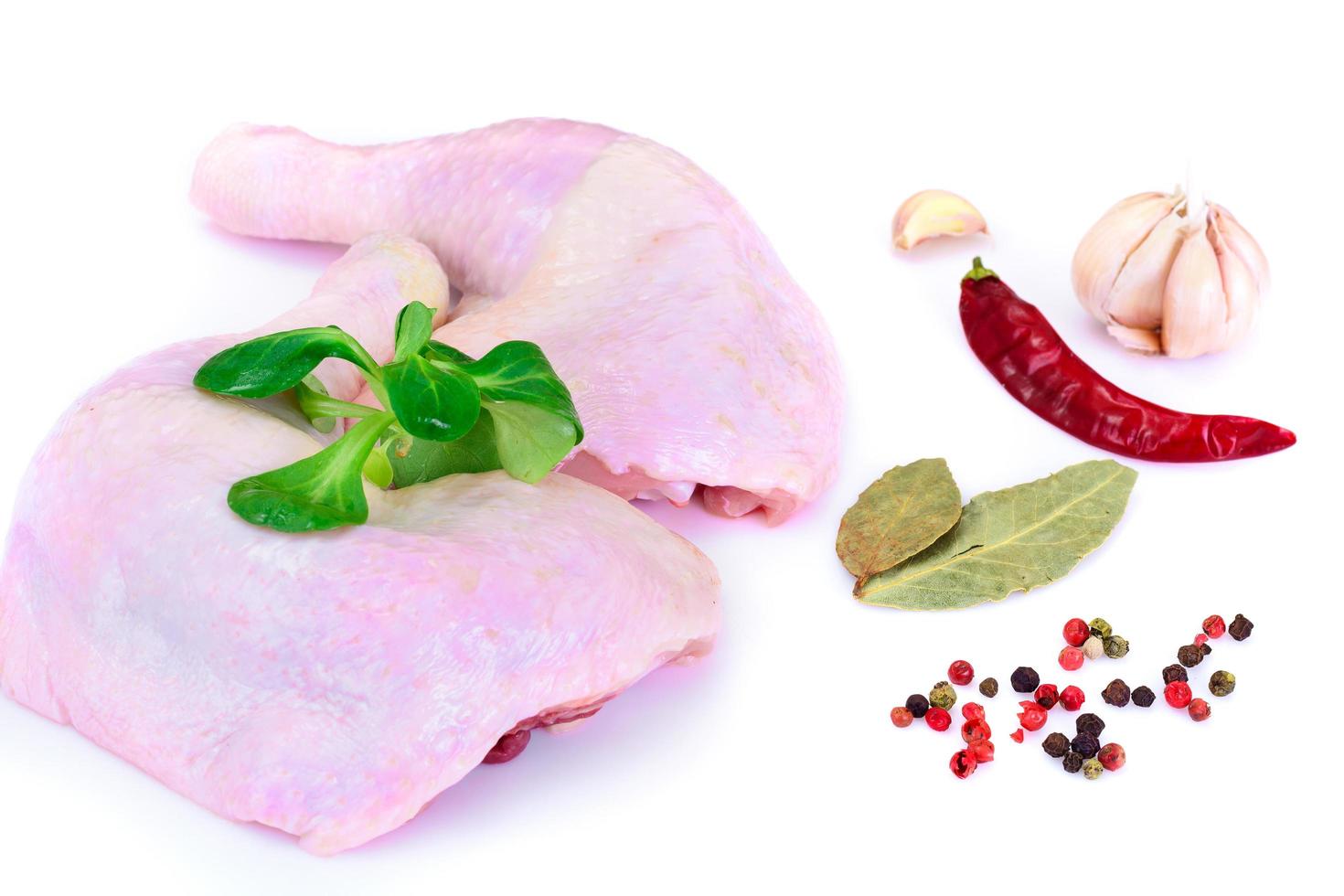 Raw Chicken. Leg. Isolated on White. photo