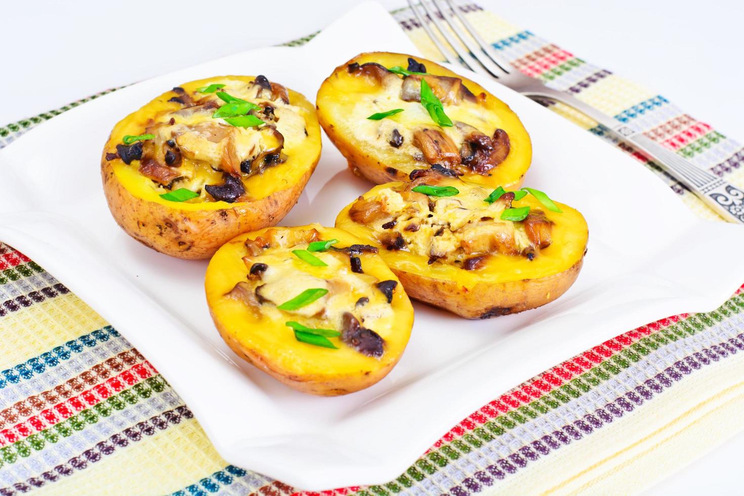 Potatoes Stuffed with Mushrooms and Cheese photo