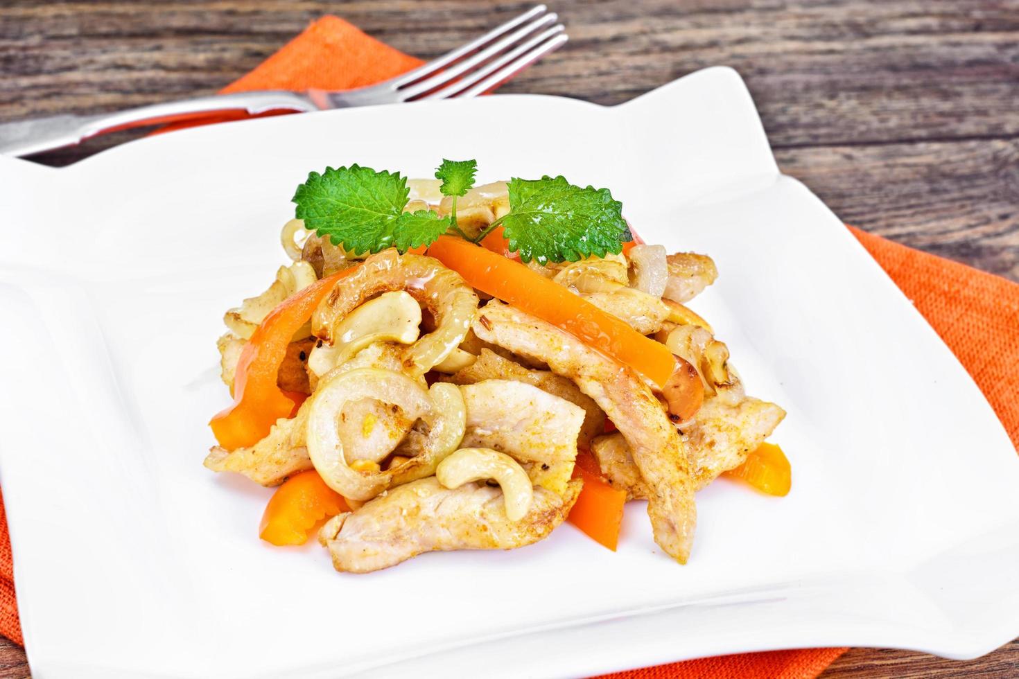 Chicken with Cashew Nuts and Sweet Paprika Grilled. Asian, Thai photo