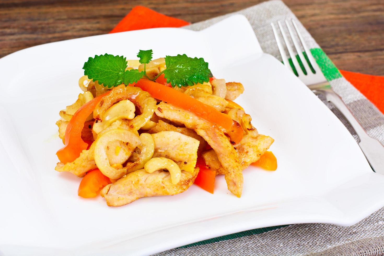 Chicken with Cashew Nuts and Sweet Paprika Grilled. Asian, Thai photo