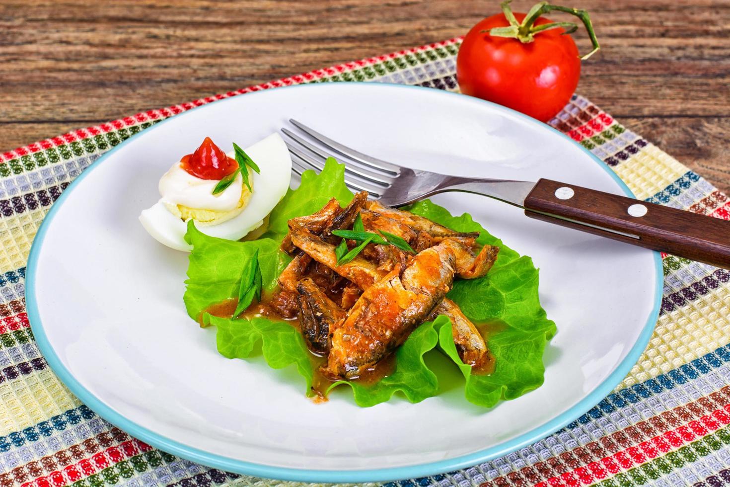 Canned Fish with Eggs on Lettuce photo