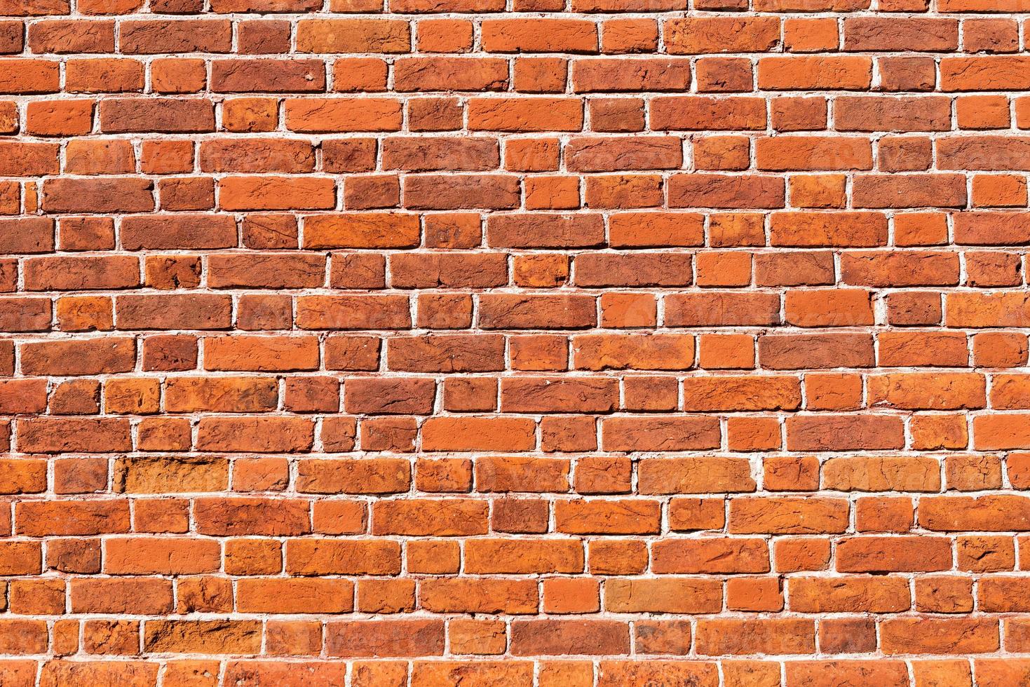 Fondo de pared de ladrillo rojo, textura de ladrillo vintage foto