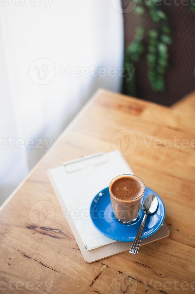 Hot coffee on table with abstract emotion photo