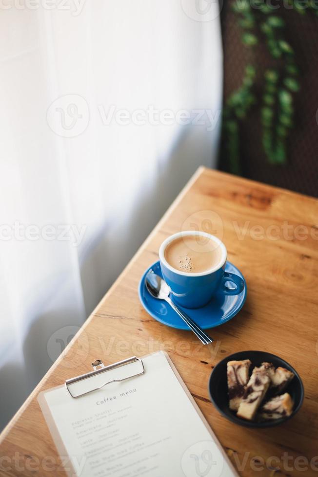 Hot coffee on table with abstract emotion photo