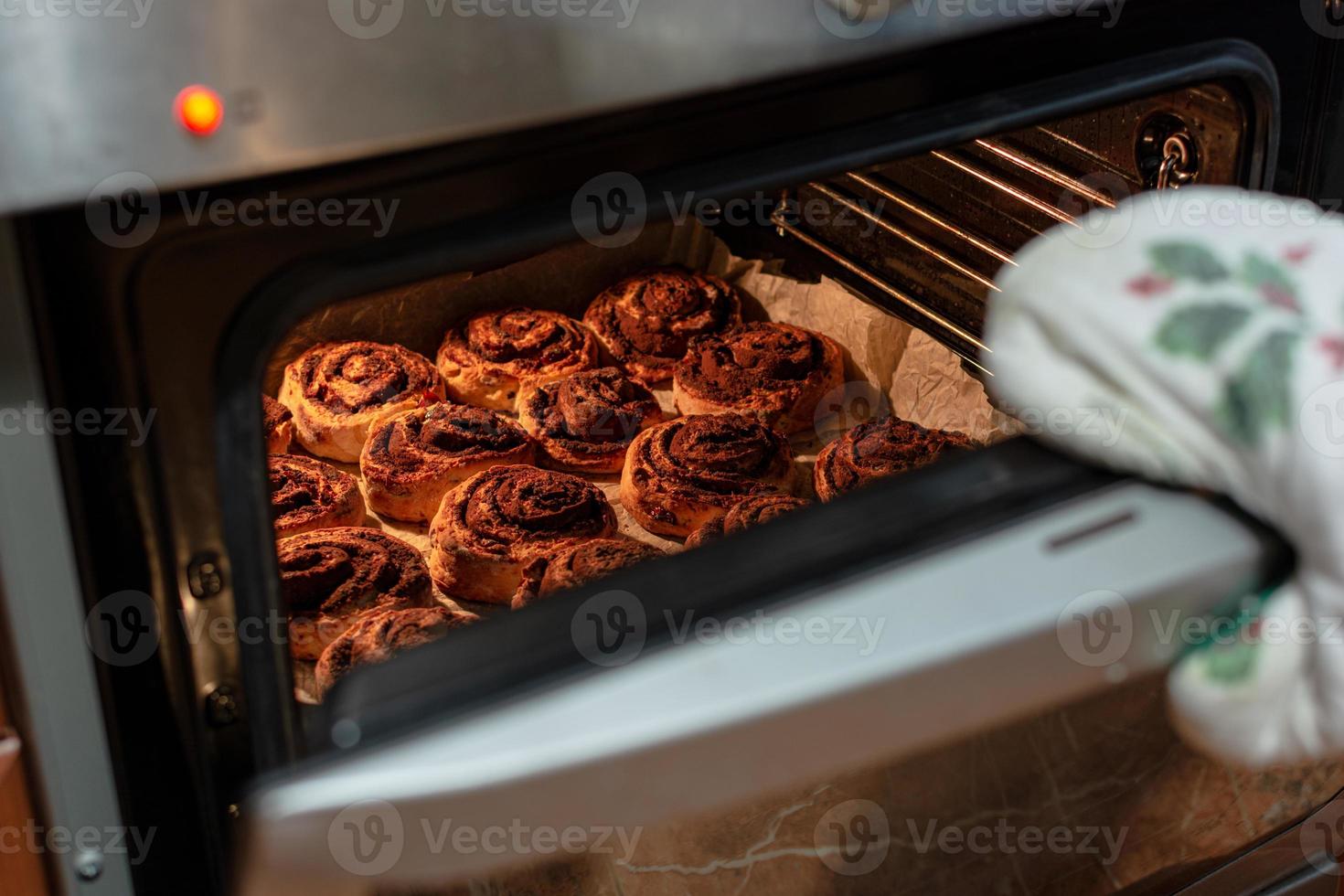 Cinnabons in the oven. photo