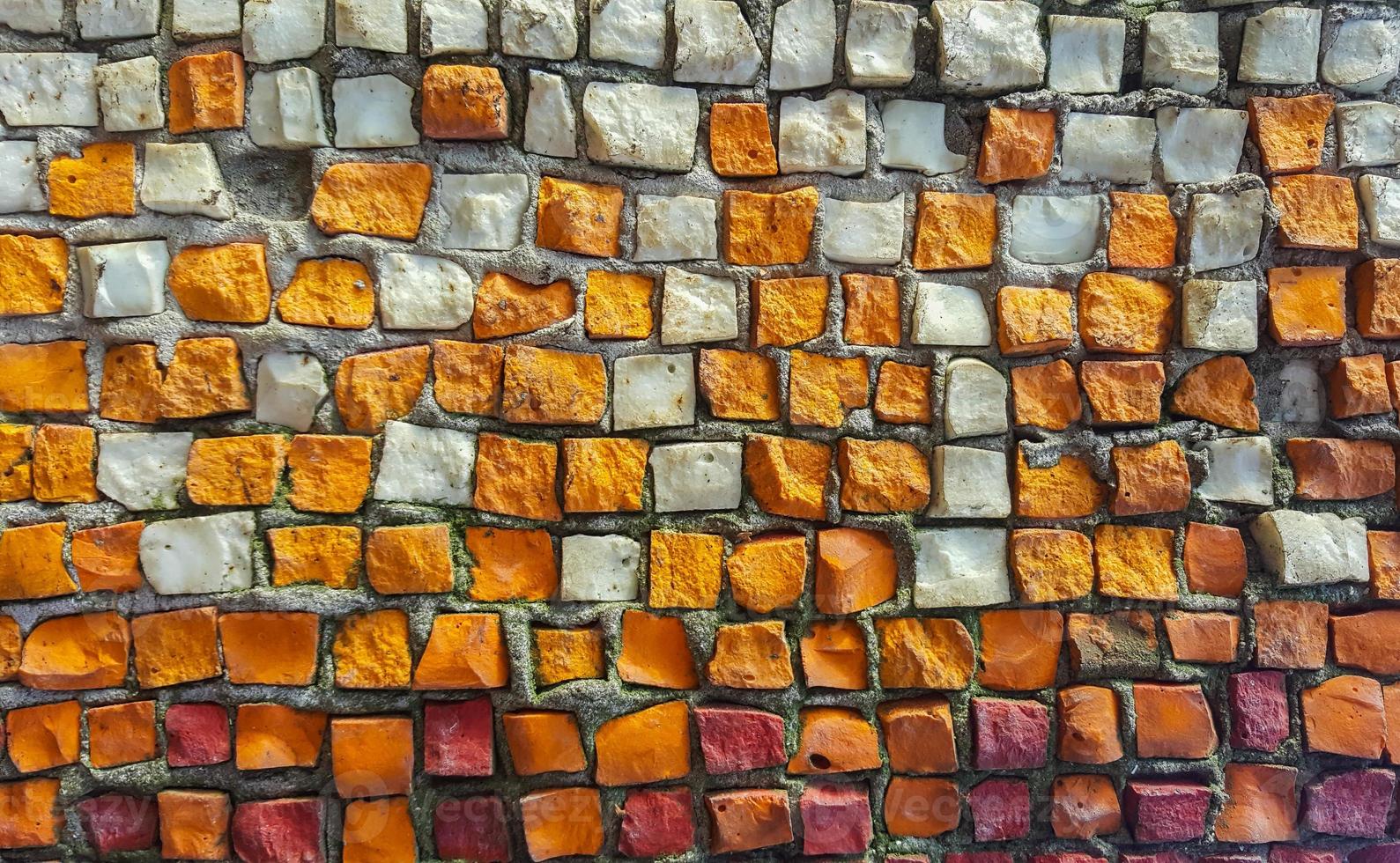 The texture of the old mosaic of small stones photo
