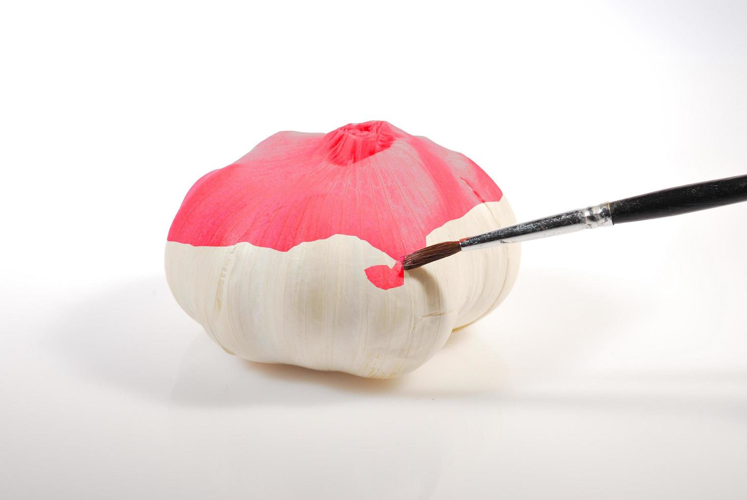 red garlic on white photo
