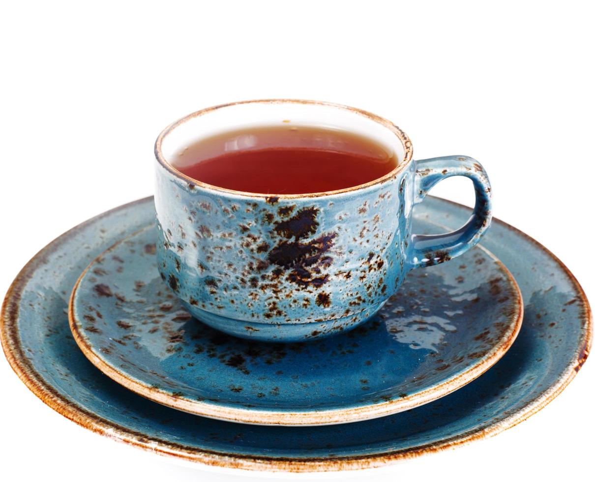 té rojo en taza hermosa foto