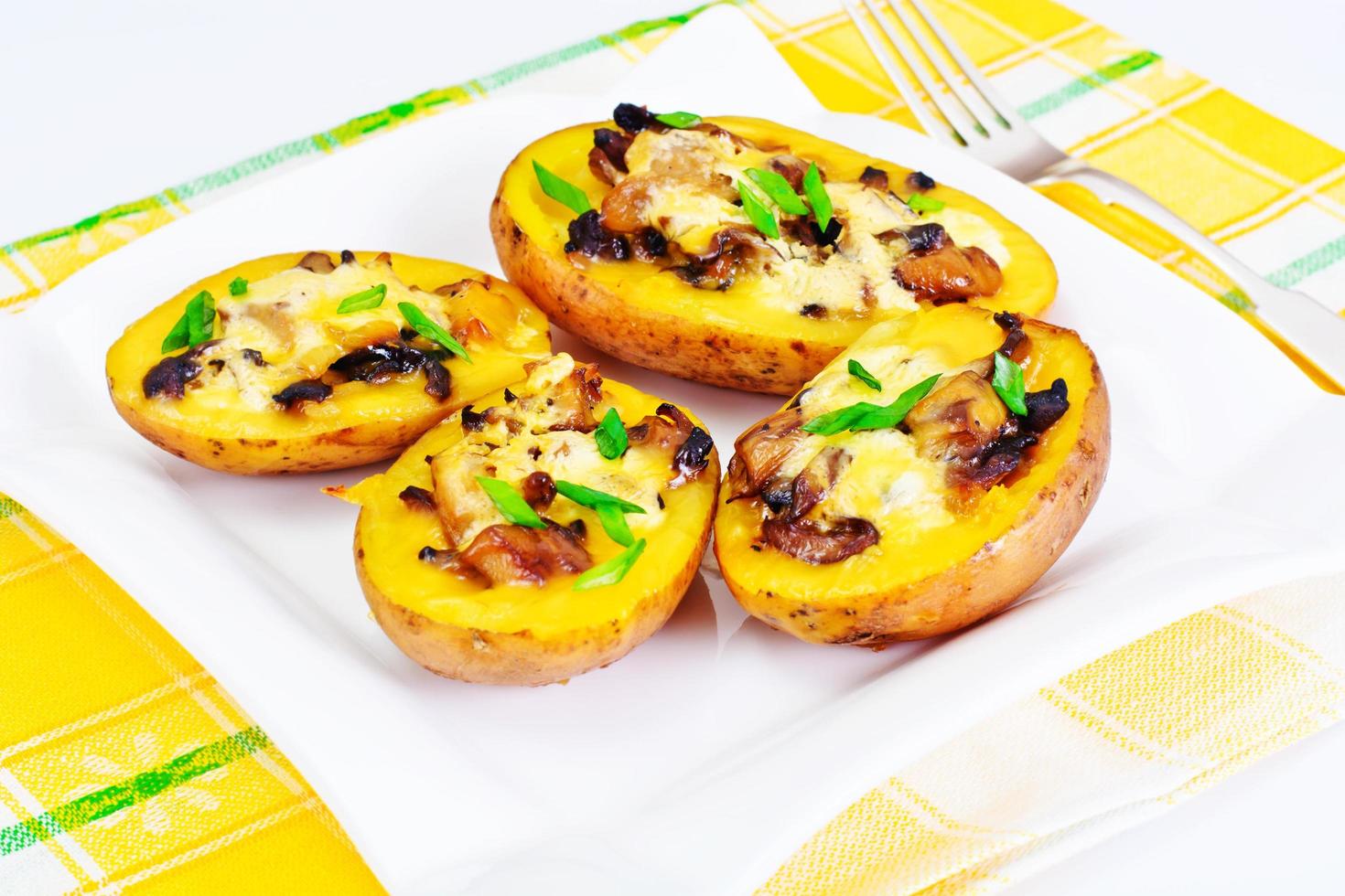 Potatoes Stuffed with Mushrooms and Cheese photo