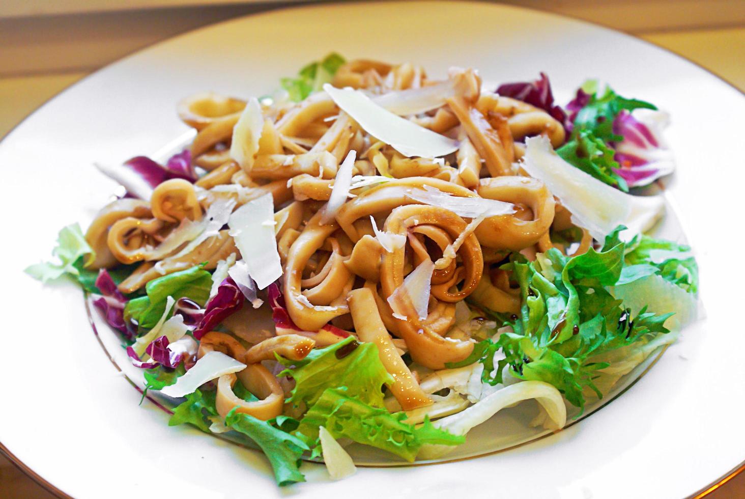 Dietary Food. Seafood Salad, Squid and Fresh Vegetables. photo