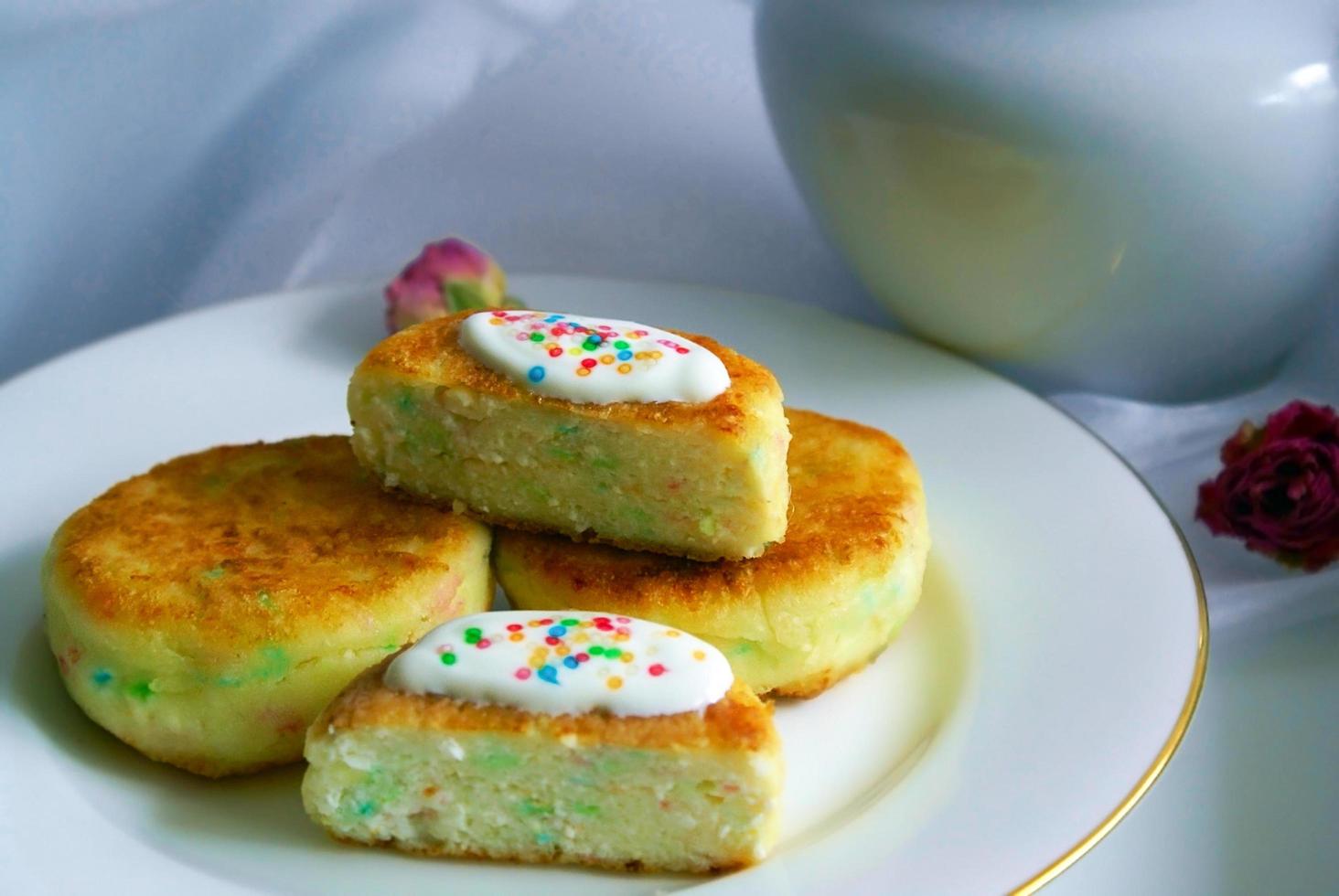 Cheesecakes with Multi Colored Sprinkles. photo