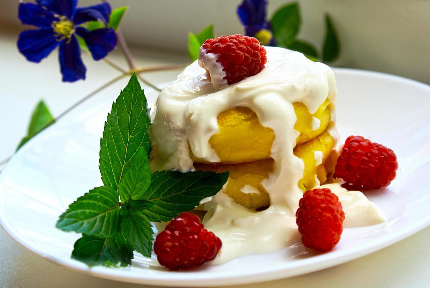 Delicious Sheesecake with Raspberries and Mint. photo