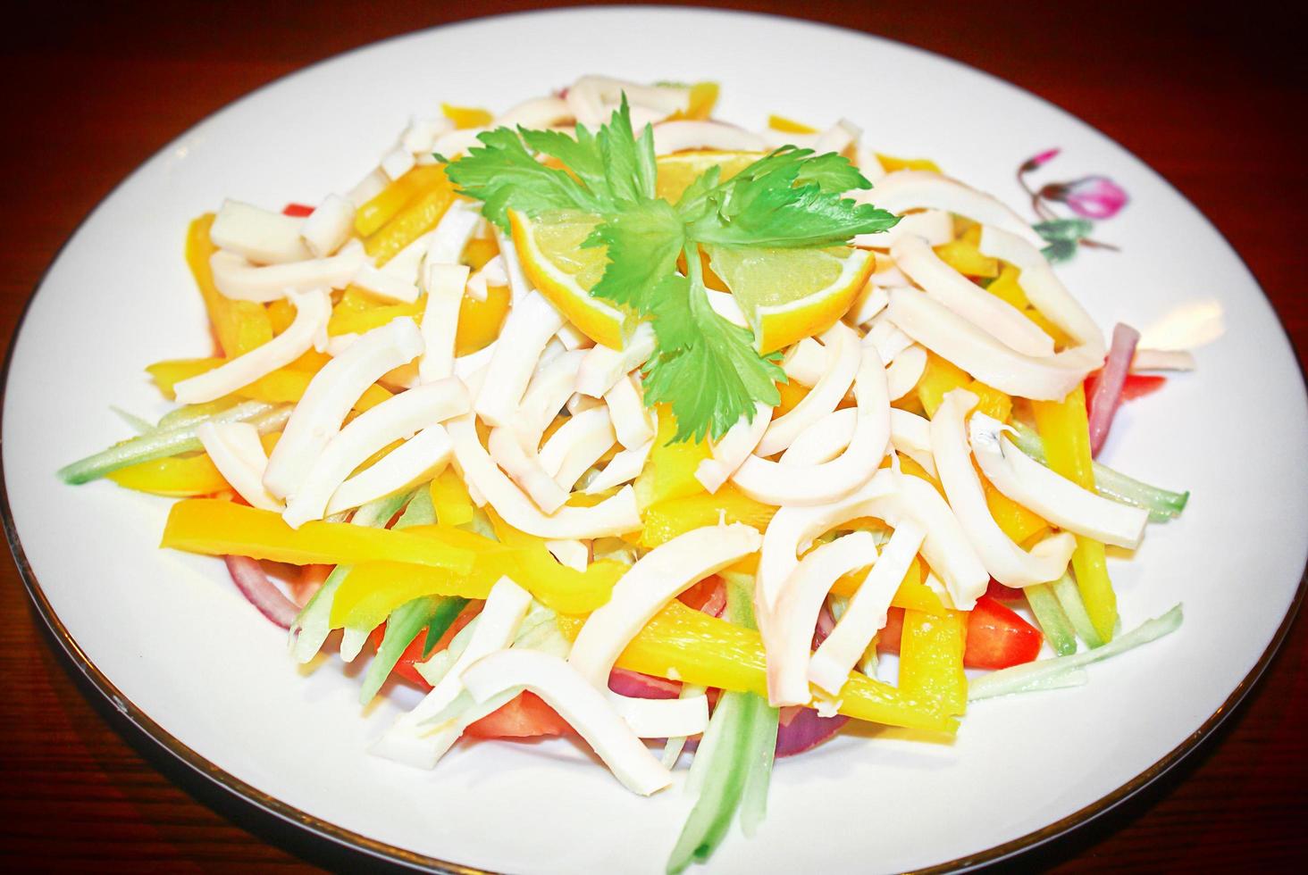 Dietary Food. Seafood Salad, Squid and Fresh Vegetables. photo