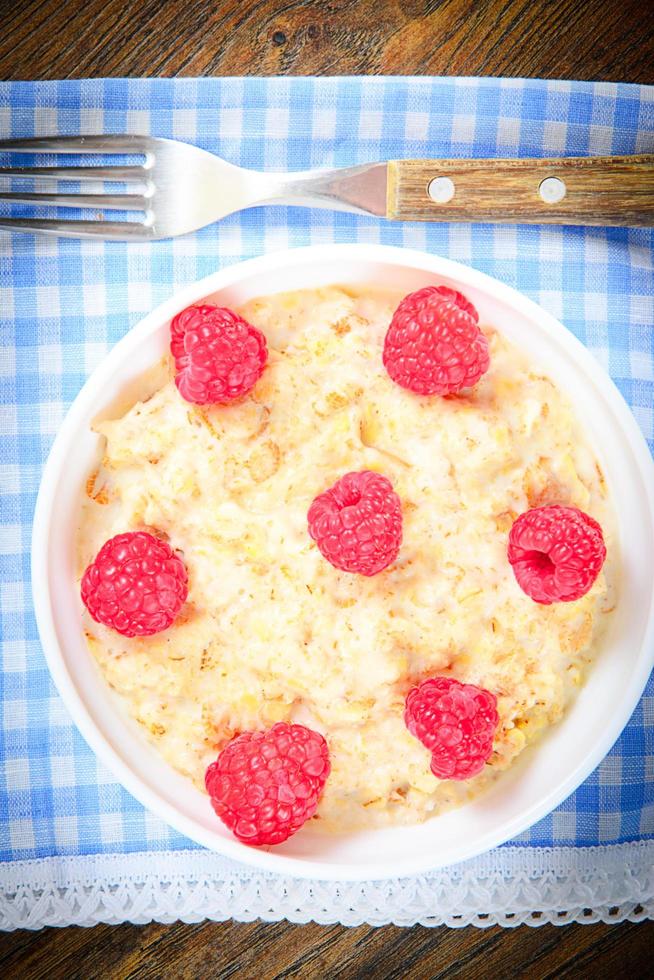 Oatmeal with Raspberries. Classic English Breakfast photo