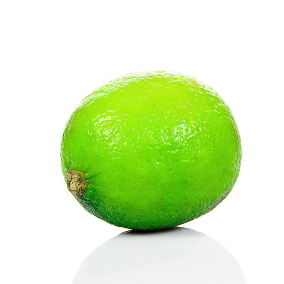 Fresh Green Lime on White Background photo