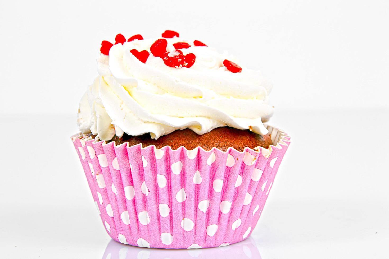 Cake with Cream, Cupcake on White Background. photo