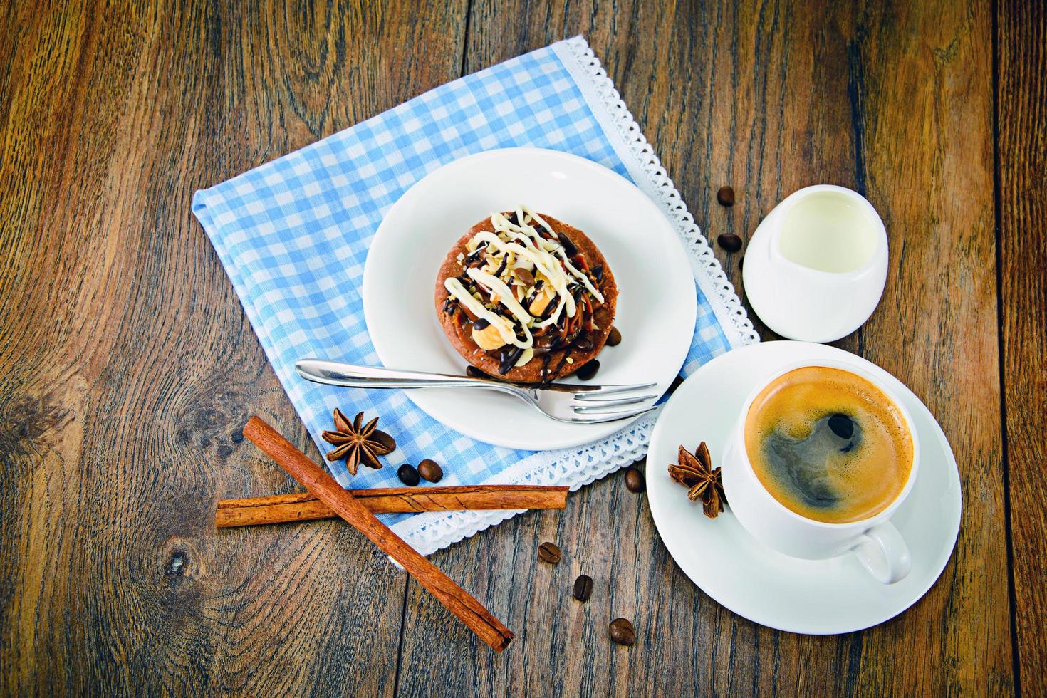 Chocolate Nut Cake on Vintage Retro Woody Background photo