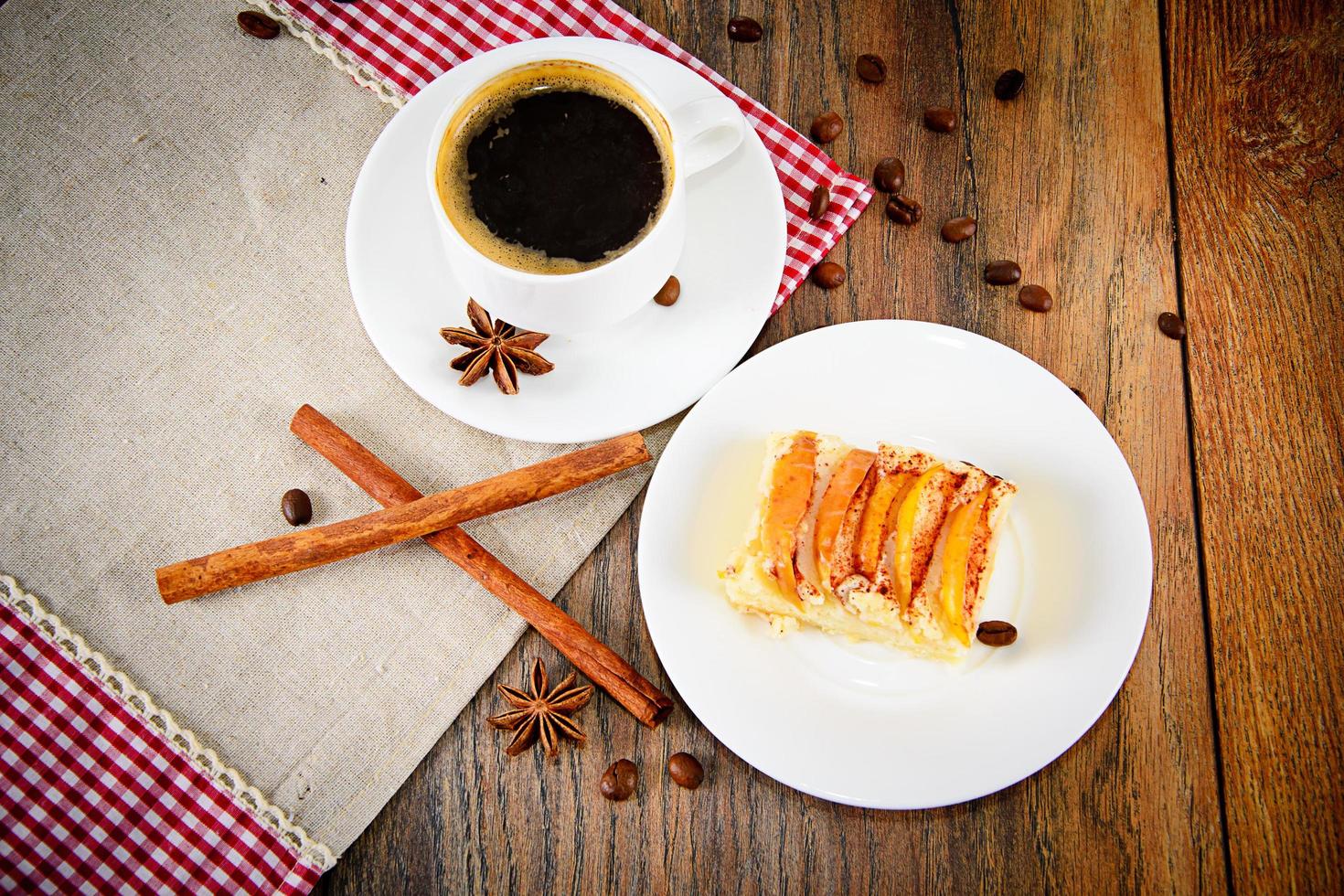 Coffee Cup with Apple Pie on Woody Backfround photo