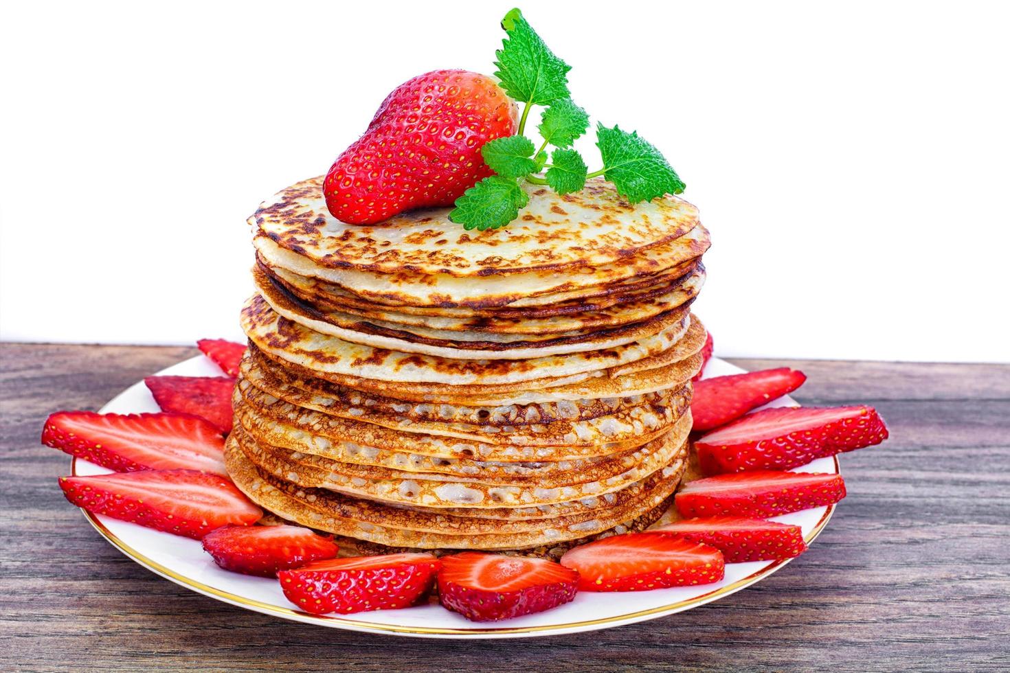 Tasty Pancakes Stack with Strawberry photo