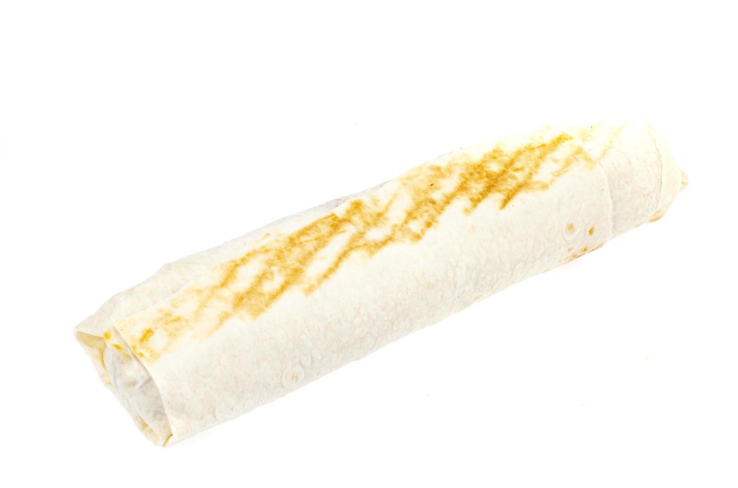 Shawarma, lavash with meat and vegetables. Photo