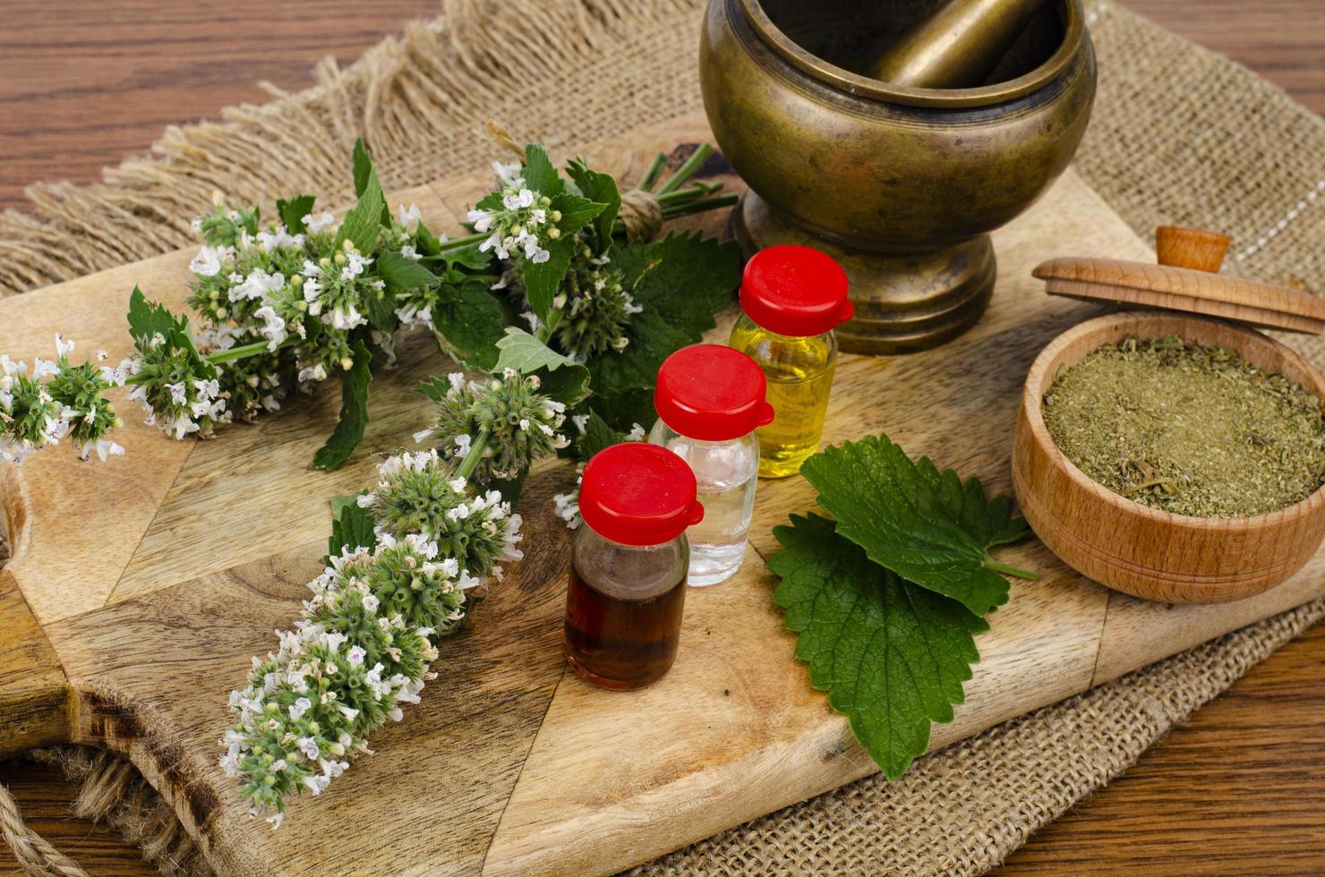 The use of herbs in folk medicine, bottles of tinctures. photo