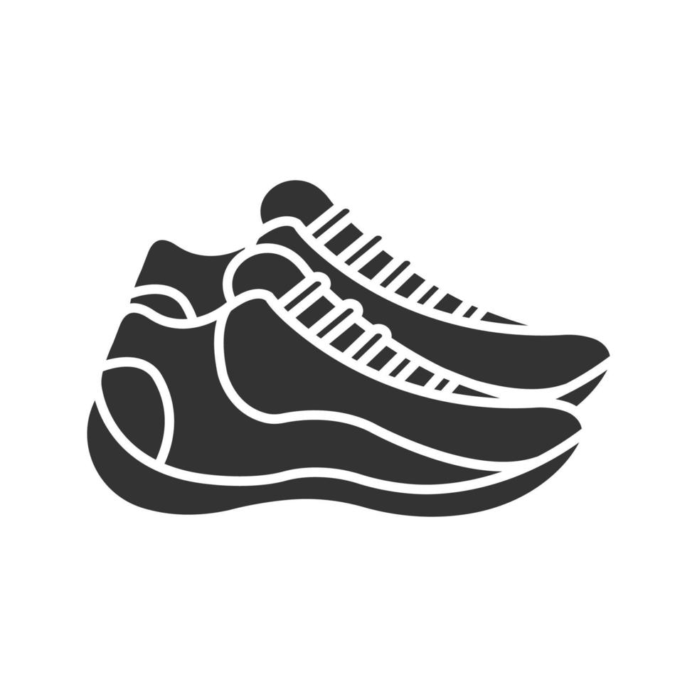 Sneakers glyph icon. Silhouette symbol. Trainers. Sports footwear. Negative space. Vector isolated illustration
