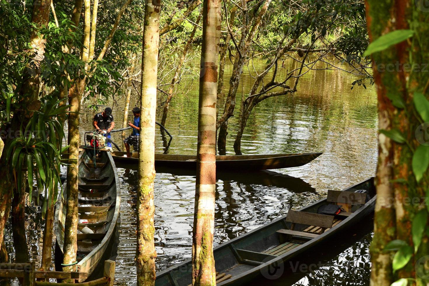 Canoes, Yasuni, Amazon, Ecuador photo