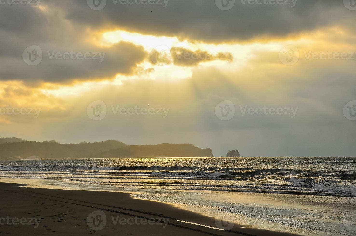 A stormy sunset on teh beach photo